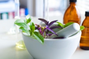 mortar and pestle with herbs